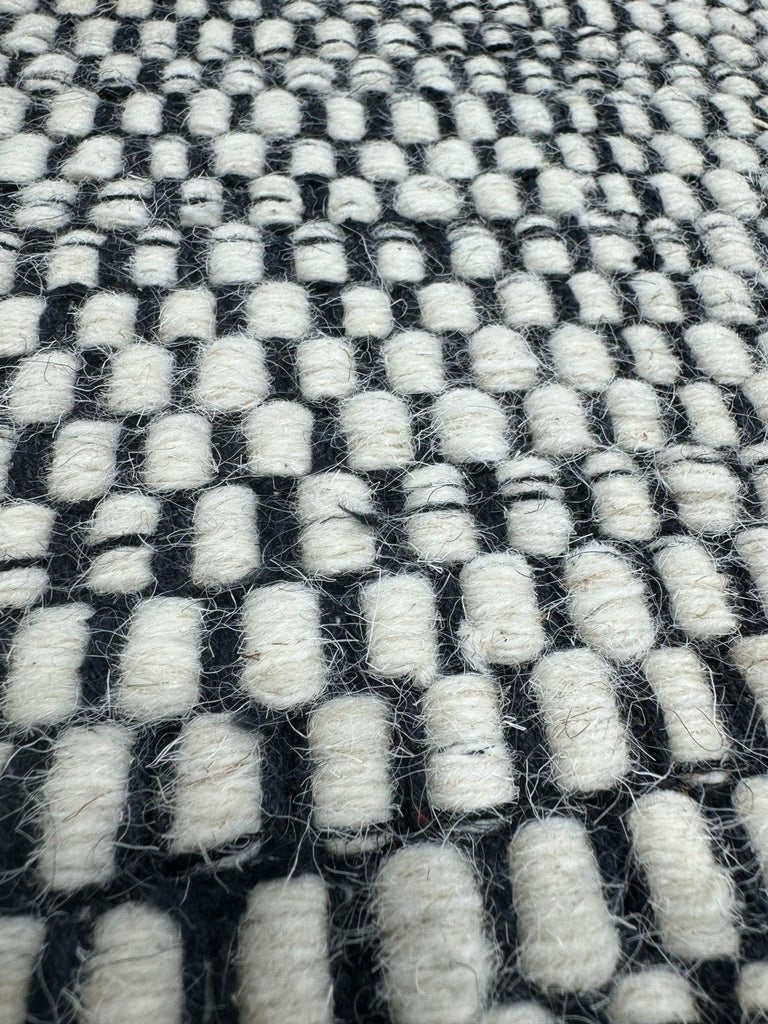 ALFOMBRA LANA TAXURE BLANCO Y NEGRO 140X200 - laalfombreria